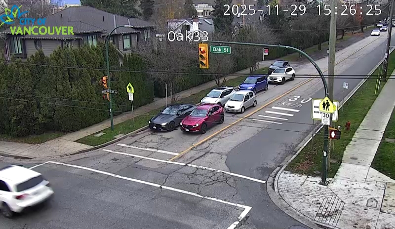 Oak St & W 33rd Ave - E