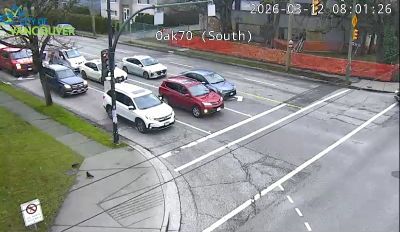 Oak St & W 70th Ave - W